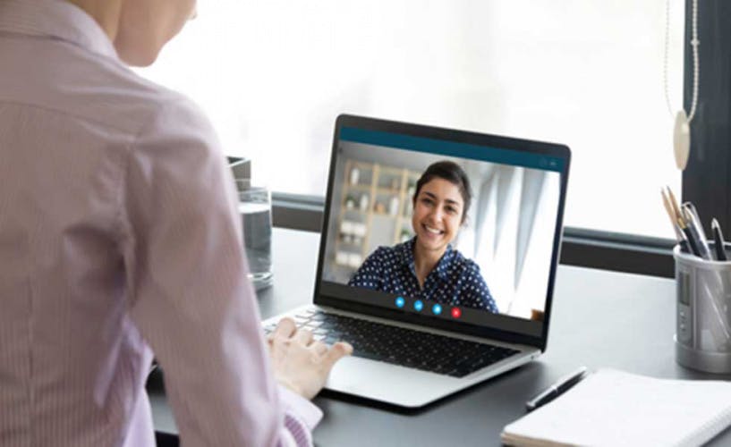 woman being interviewed by video link